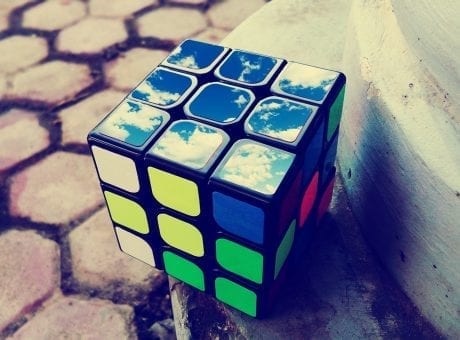 rubix cube with clouds reflecting