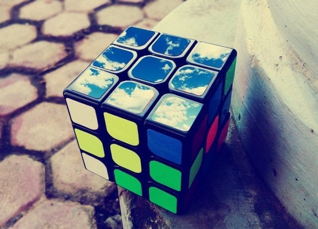 rubix cube with clouds reflecting
