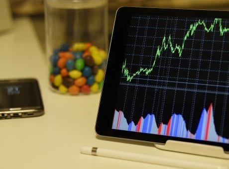 tablet with stock trendline