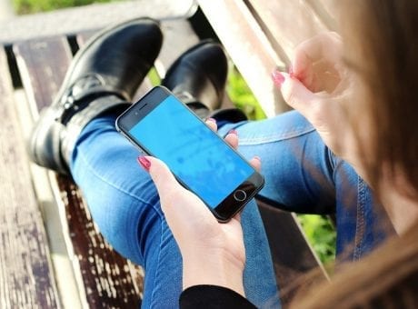 girl holding smartphone