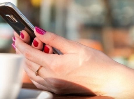 girl holding smartphone