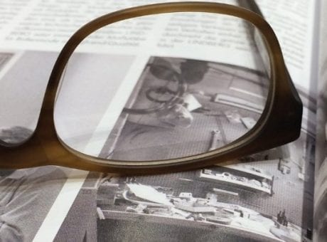 glasses on magazine