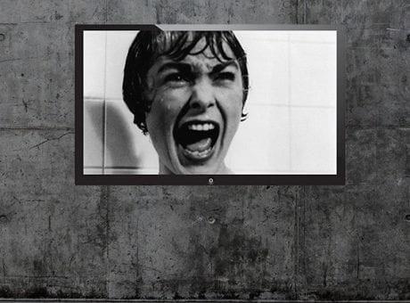 person screaming on tv screen black and white