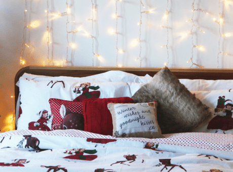 bed and christmas tree