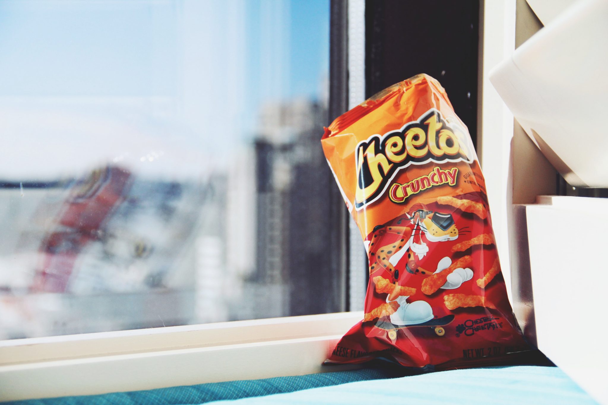 Bag of Cheetos near window