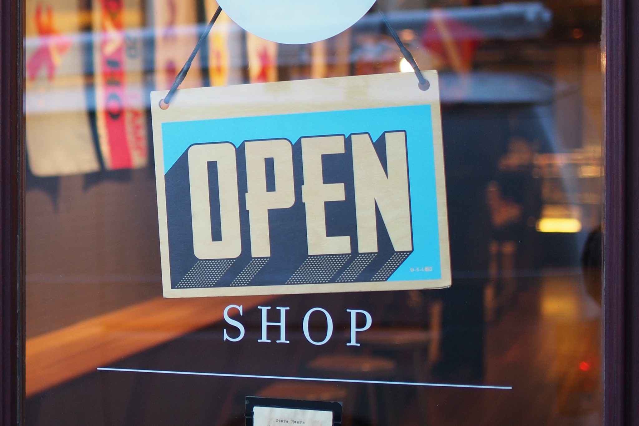 Storefront Sign That Reads Open